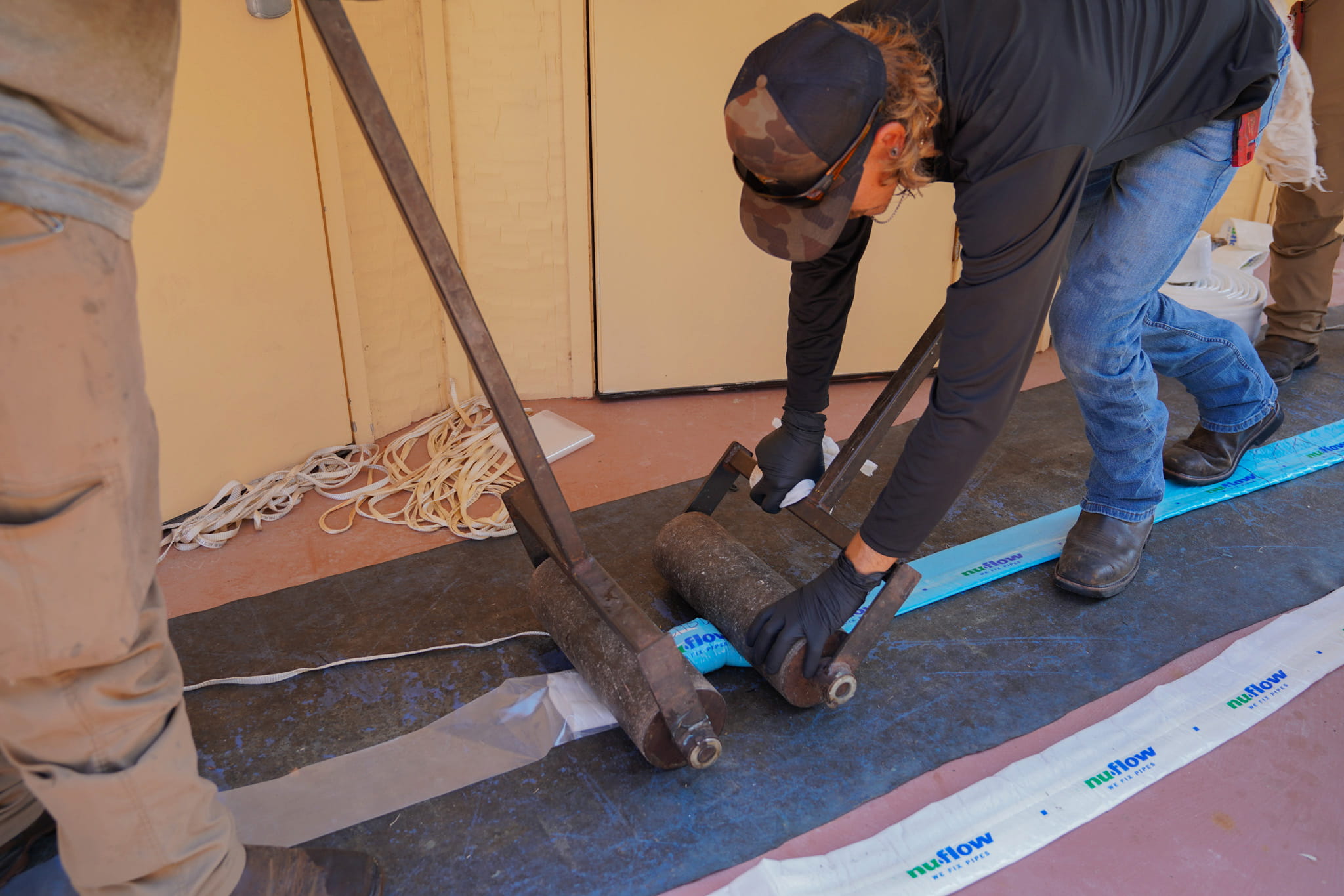 PRS crew performing drain and sewer pipe lining