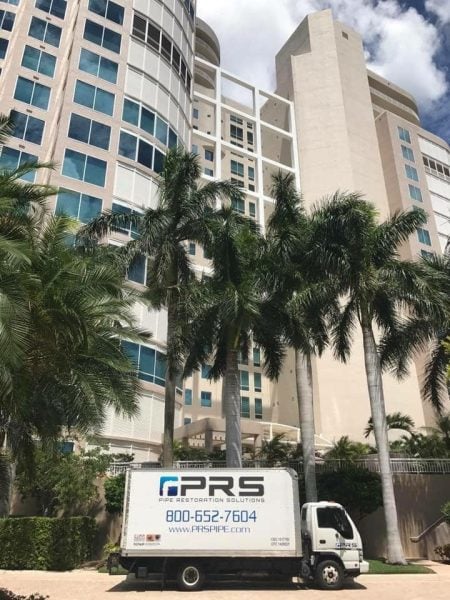 PRS company truck in front of condo building