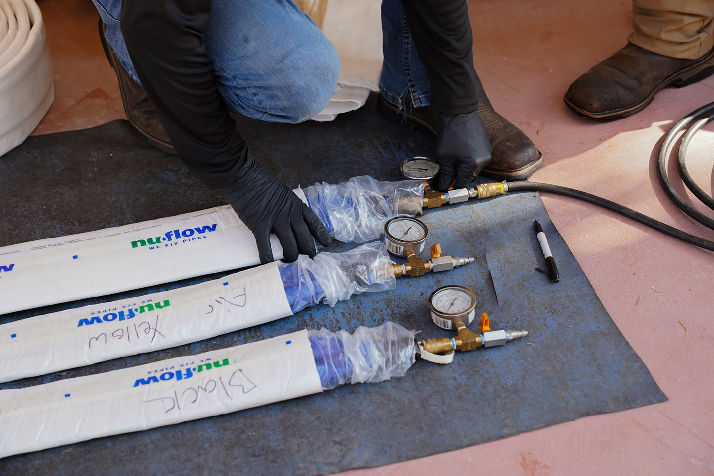 PRS technicians preparing for small diameter pipe lining