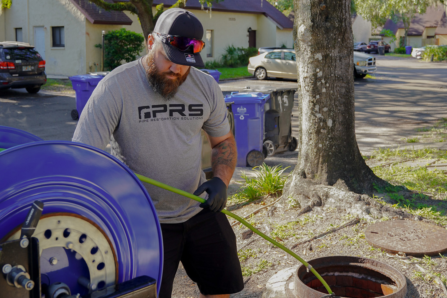 PRS technician performing sewer pipe repair services