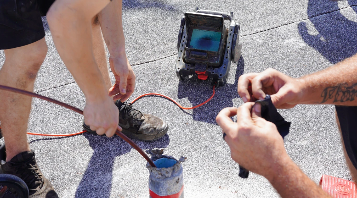 PRS technicians performing cast iron pipe lining